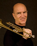 Dave Rocha, trumpet on shoulder